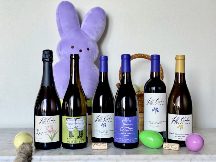 Jeff Cohn Cellars Easter wine line up with a giant purple peep and kitty paw