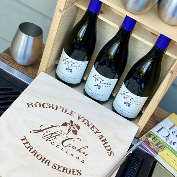 Rockpile Terroir Series Vertical on a grill with stainless steel wine glasses
