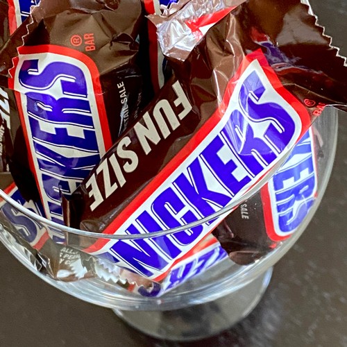 fun size Snickers bars in a wine galss