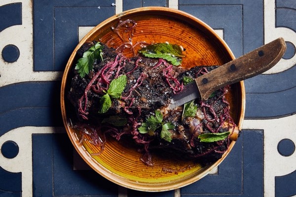 At Maydān the lamb shoulder is cooked sous vide until meltingly tender and then finished in the hearth until crisp and golden brown. We adapted their recipe for the oven to similar effect.