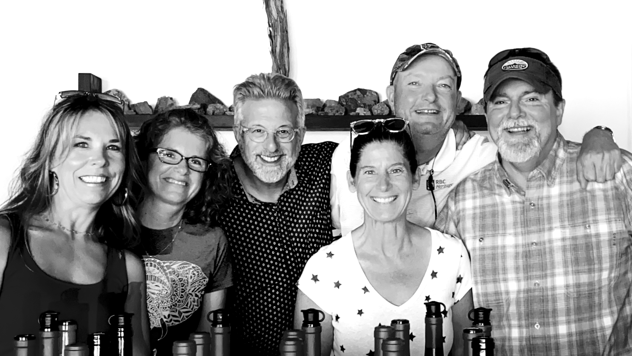 jeff cohn smiling and having a good time with wine club members and friends